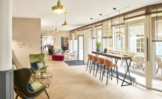 Open plan work and lounge area at MAXX by Deutsche Hospitality